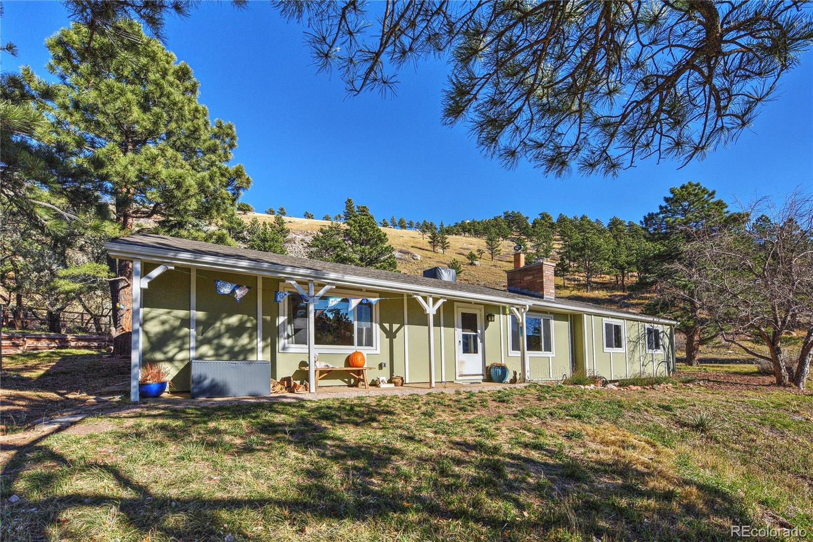 5384 Olde Stage Road Boulder, CO 80302 - Photo 28 of 28 a view of a house with a yard
