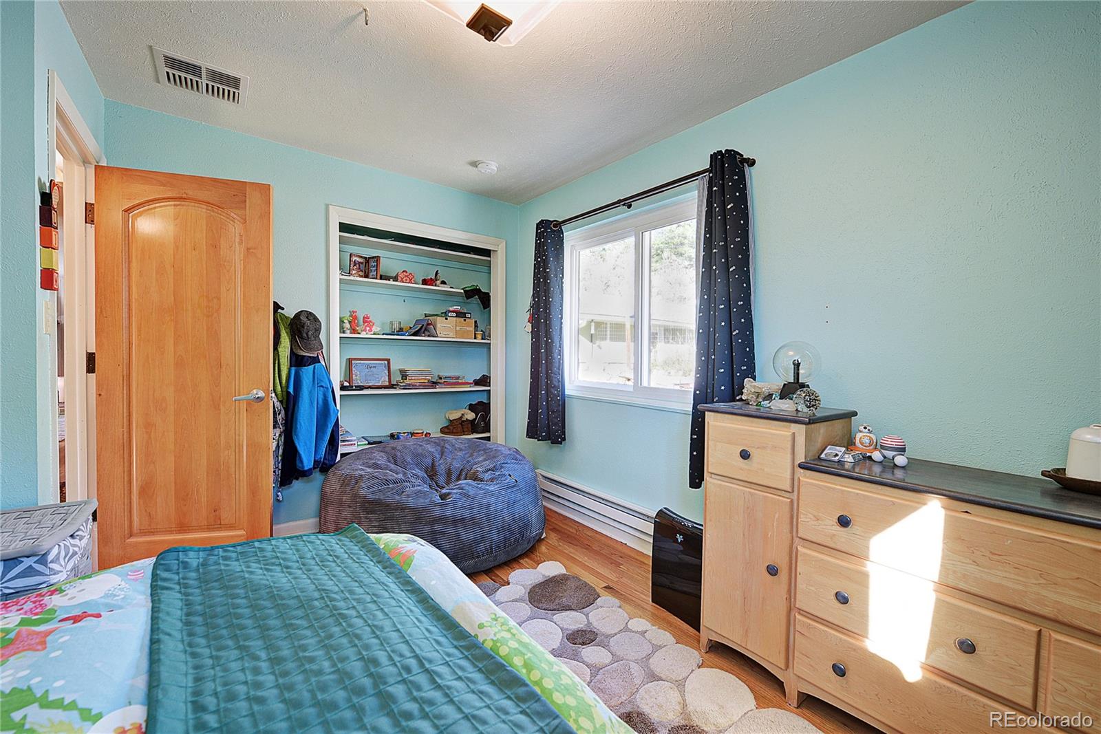 5384 Olde Stage Road Boulder, CO 80302 - Photo 10 of 28 a bedroom with a bed and a window
