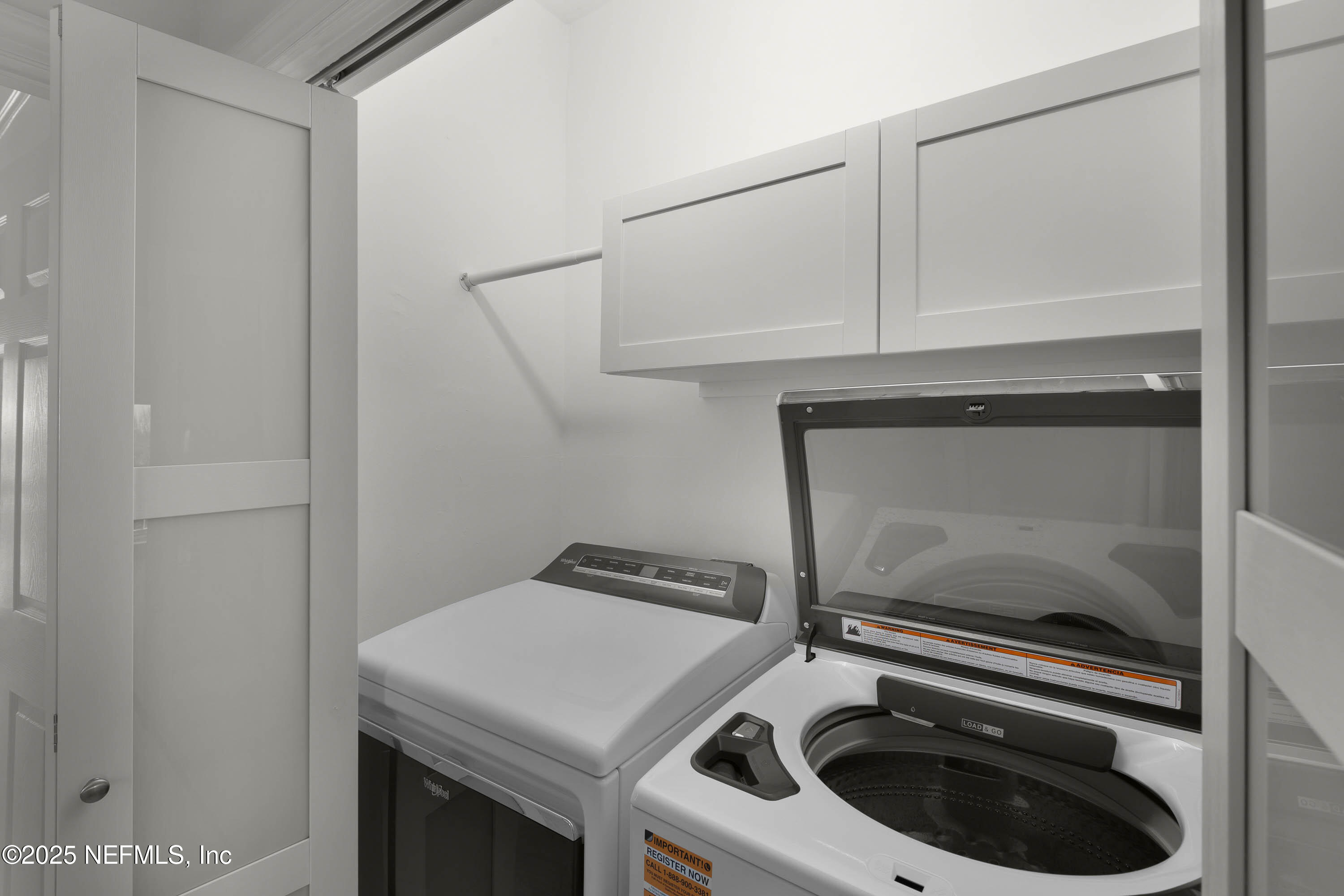 624 Ponte Vedra Boulevard, Unit C8 Ponte Vedra Beach, FL 32082 - Photo 22 of 26 a utility room with dryer and washer