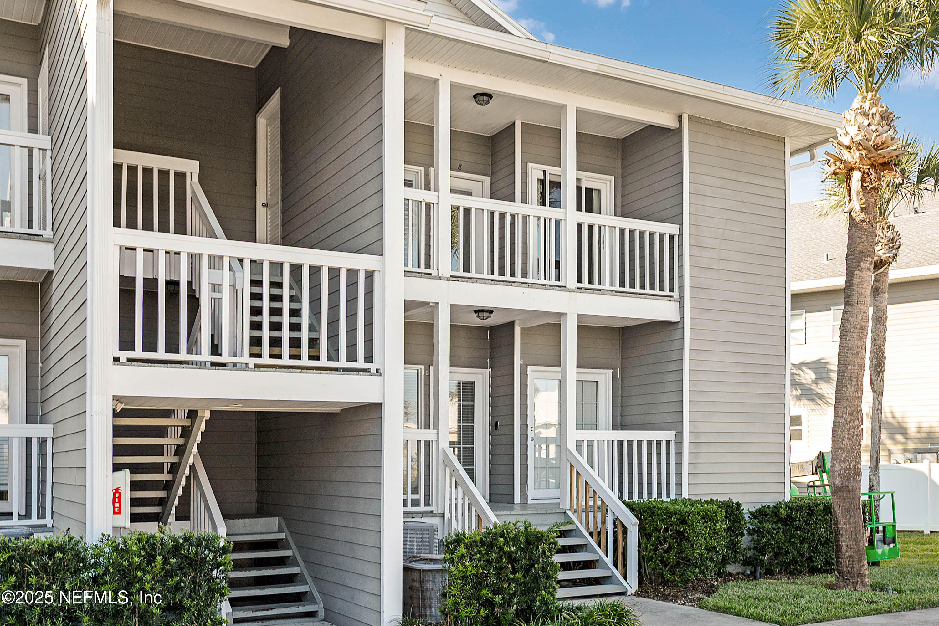 624 Ponte Vedra Boulevard, Unit C8 Ponte Vedra Beach, FL 32082 - Photo 24 of 26 a front view of a house with a yard
