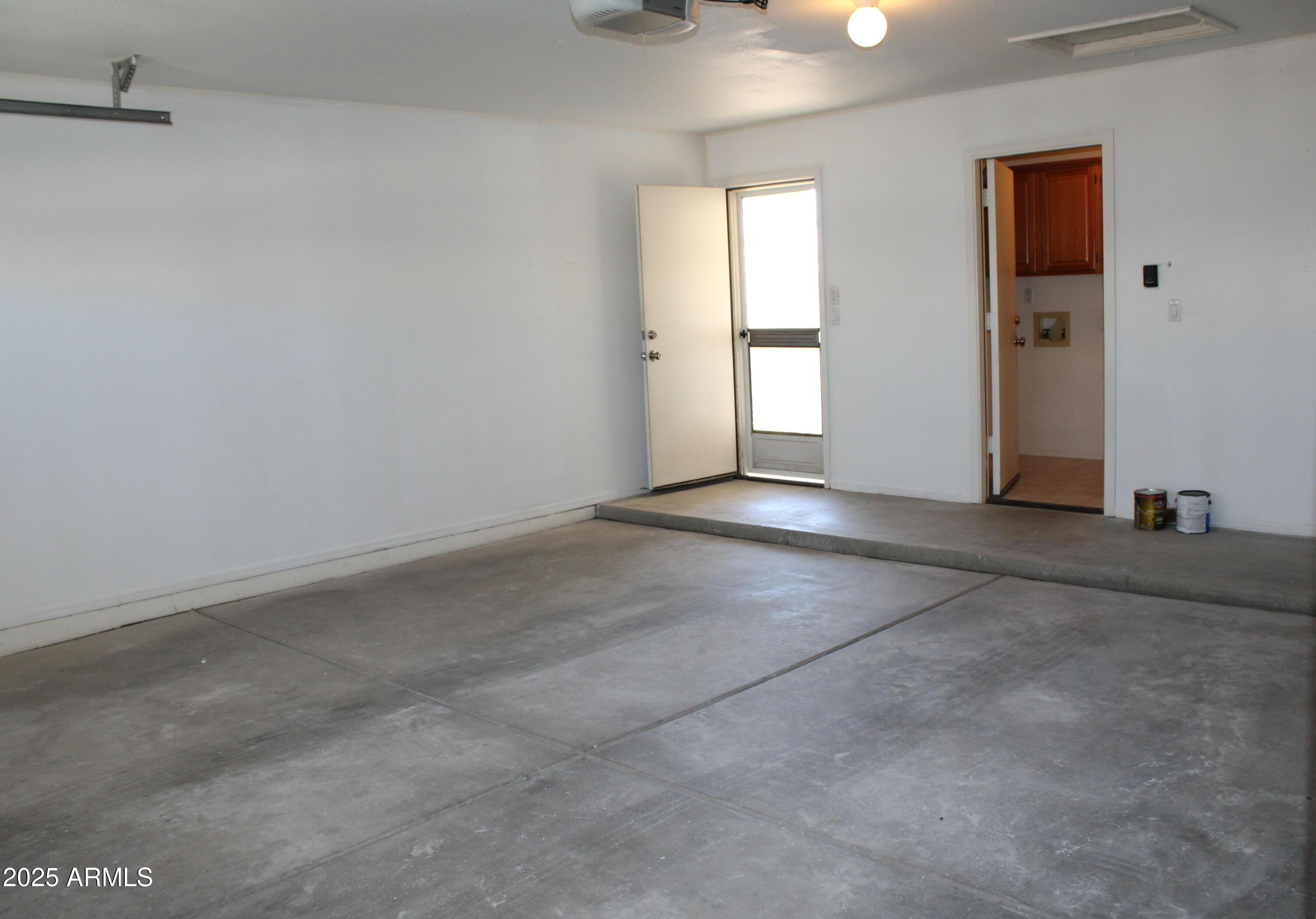14543 West Bison Path Surprise, AZ 85374 - Photo 11 of 42 a view of an empty room with a window