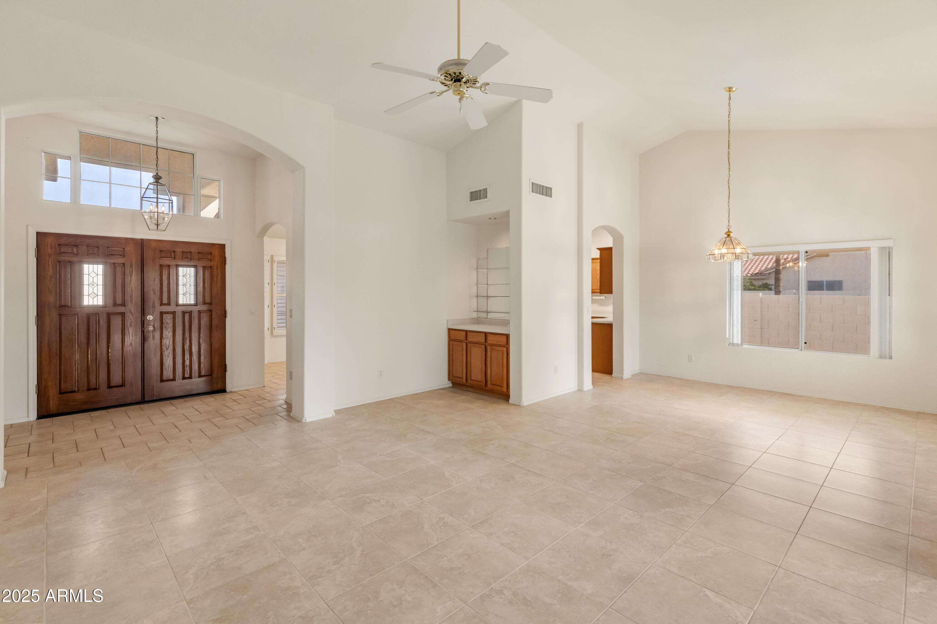 14543 West Bison Path Surprise, AZ 85374 - Photo 23 of 42 a view of empty room with a fireplace