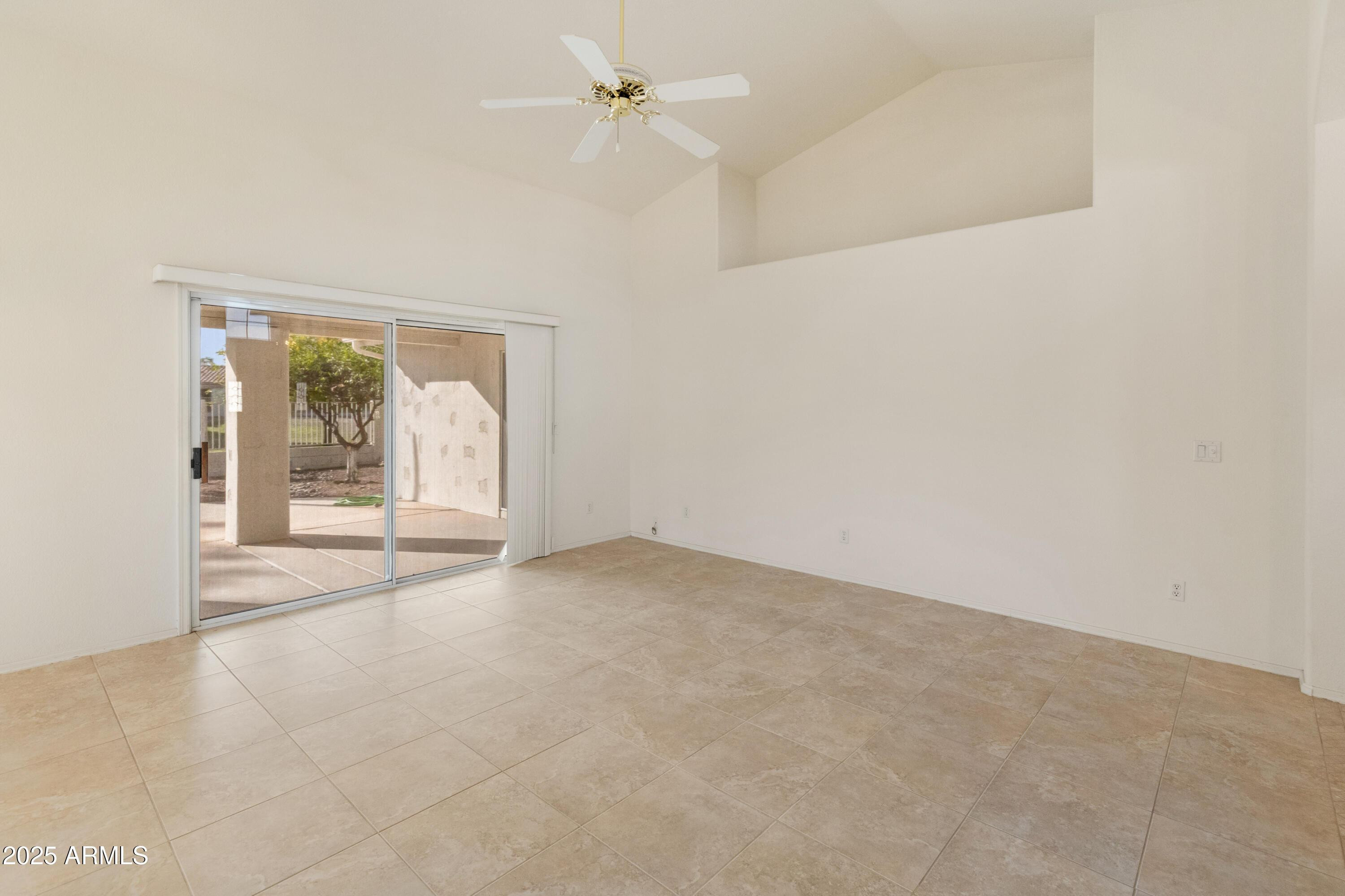 14543 West Bison Path Surprise, AZ 85374 - Photo 25 of 42 an empty room with a empty space and windows