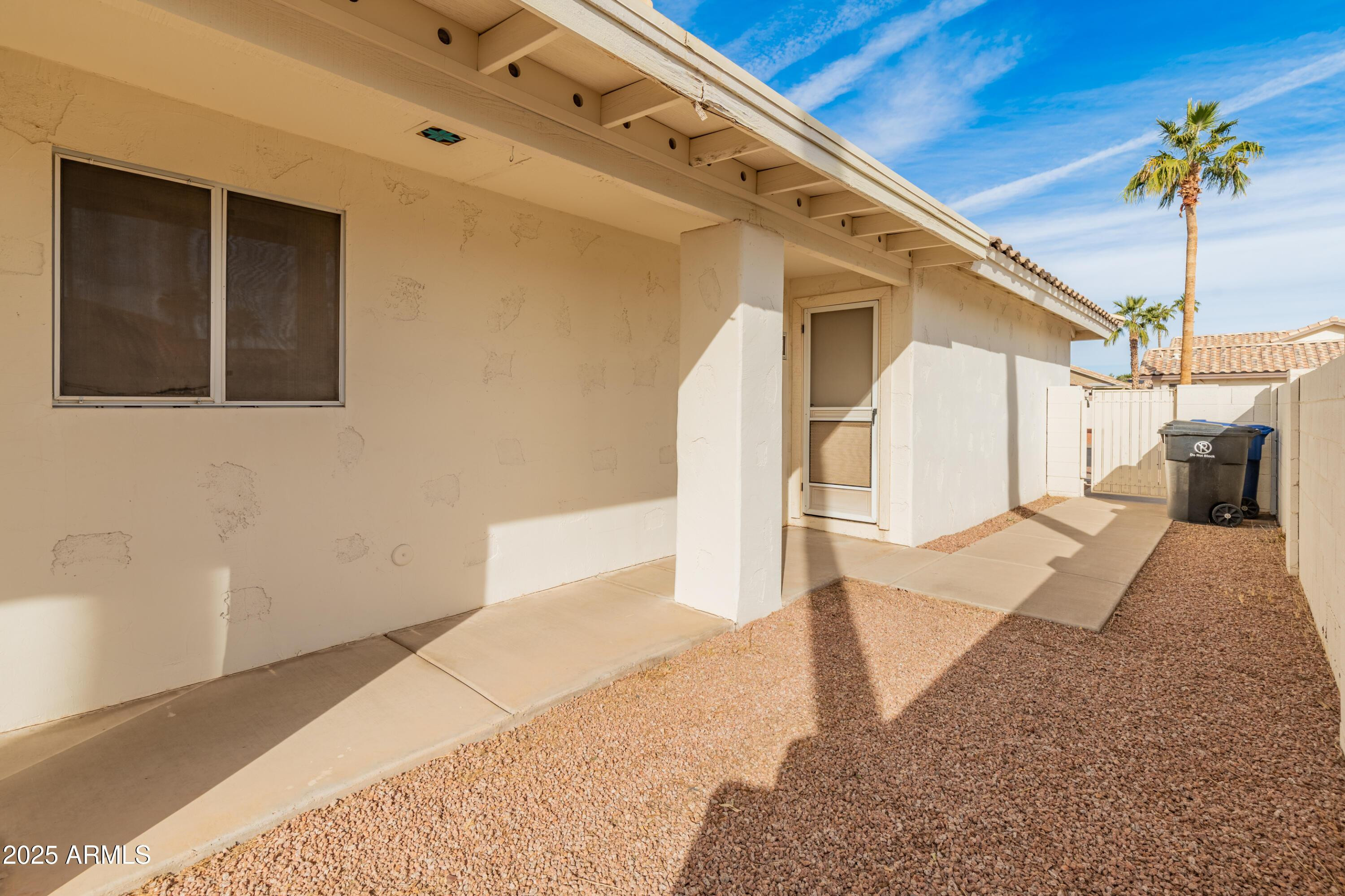 14543 West Bison Path Surprise, AZ 85374 - Photo 41 of 42 a view of a house with a patio