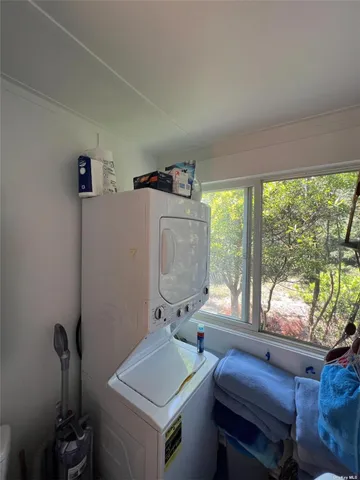 a room with furniture and a window