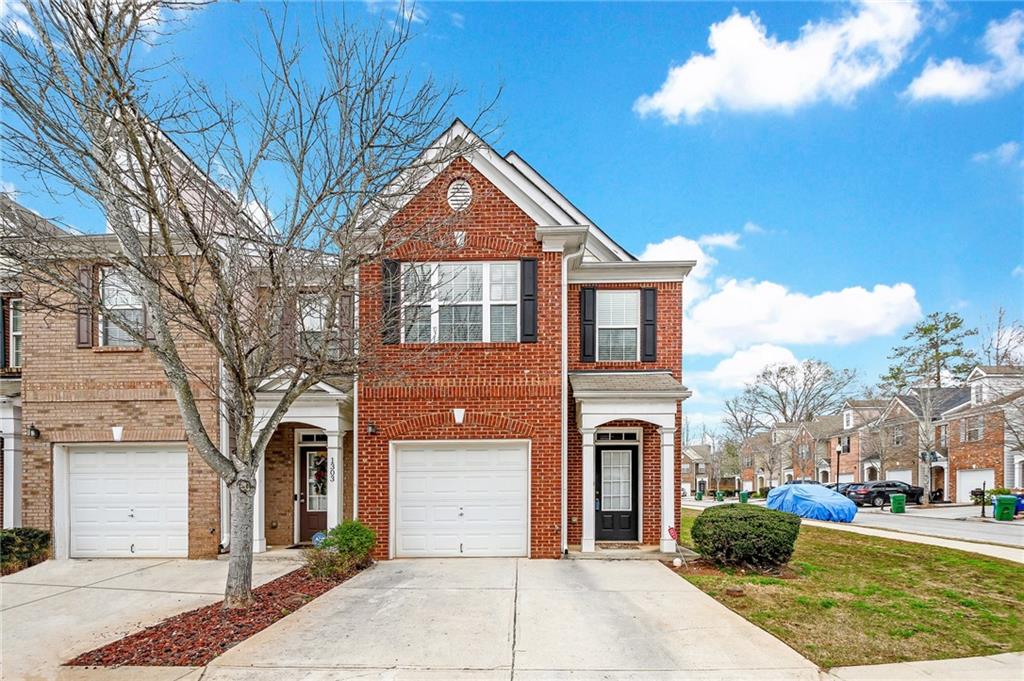 1301 Adcox Square Stone Mountain, GA 30088 - Photo 1 of 1 a front view of a house with a yard