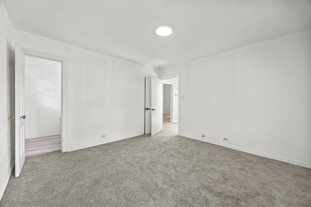 1802 Fordham Road Dallas, TX 75216 - Photo 16 of 25 an empty room with an entryway
