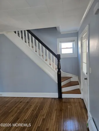 a kitchen with stainless steel appliances granite countertop a stove a microwave and a sink