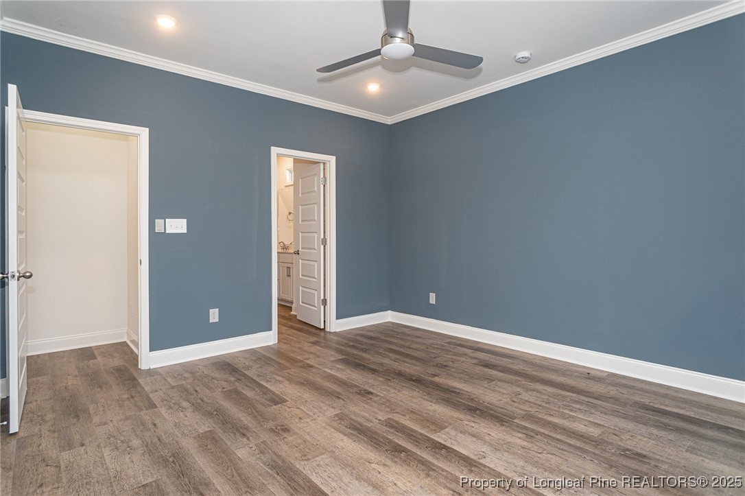 3211 Nottinghill Road Fayetteville, NC 28311 - Photo 11 of 39 a view of an empty room with window and wooden floor