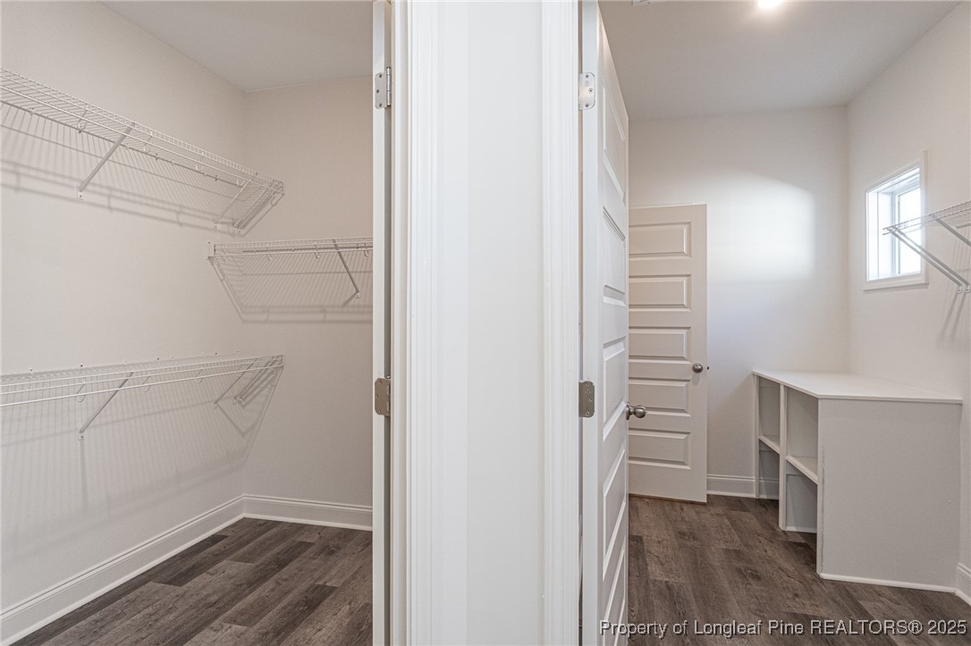 3211 Nottinghill Road Fayetteville, NC 28311 - Photo 16 of 39 a view of walk in closet with empty racks