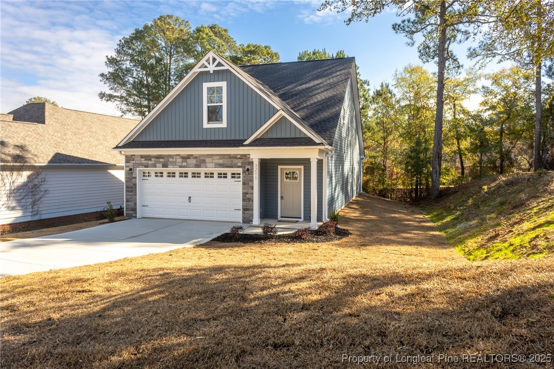 3211 Nottinghill Road Fayetteville, NC 28311 - Photo 2 of 39 a view of a house with a swimming pool