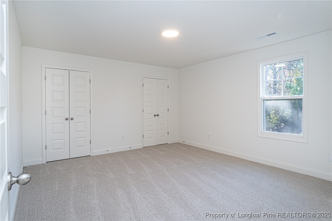 3211 Nottinghill Road Fayetteville, NC 28311 - Photo 24 of 39 an empty room with windows