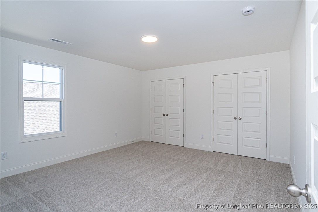 3211 Nottinghill Road Fayetteville, NC 28311 - Photo 26 of 39 an empty room with windows