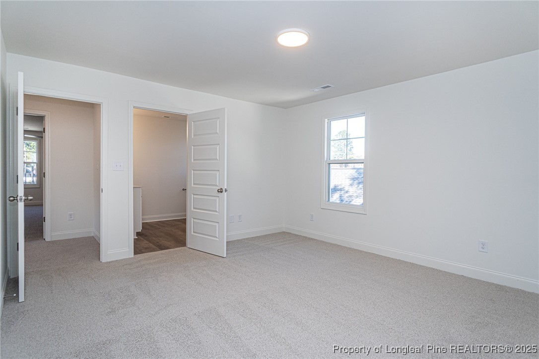 3211 Nottinghill Road Fayetteville, NC 28311 - Photo 27 of 39 an empty room with windows