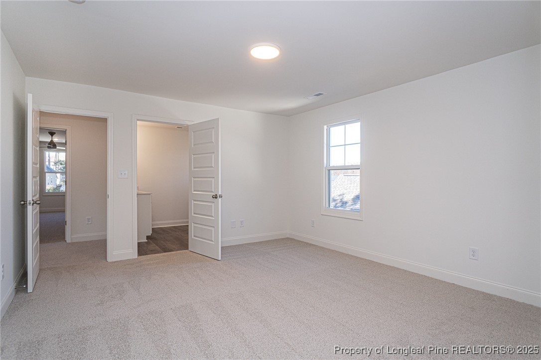 3211 Nottinghill Road Fayetteville, NC 28311 - Photo 29 of 39 an empty room with windows and closet