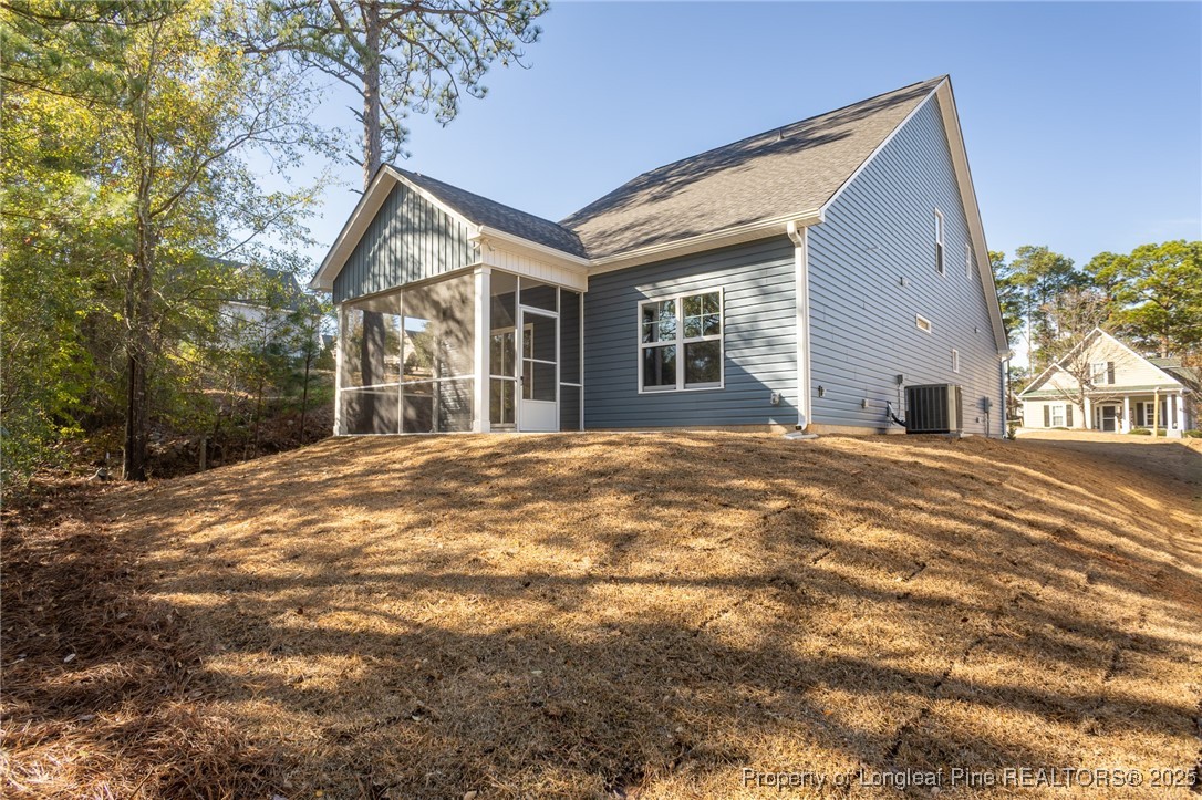 3211 Nottinghill Road Fayetteville, NC 28311 - Photo 36 of 39 a view of a house with a snow on the road