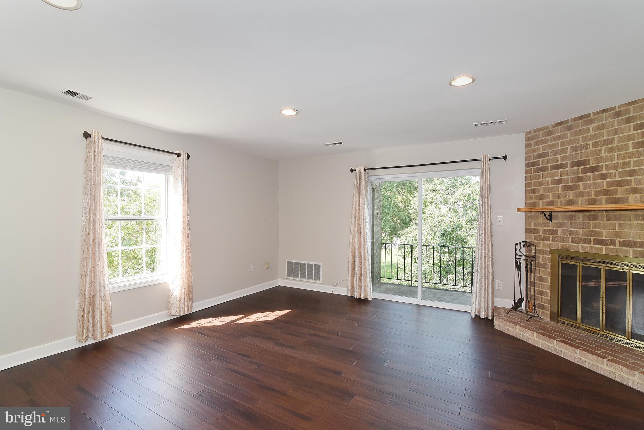 901 South Rolfe Street, Unit 2 Arlington, VA 22204 - Photo 2 of 33 Open Living / Dining w/ Fireplace