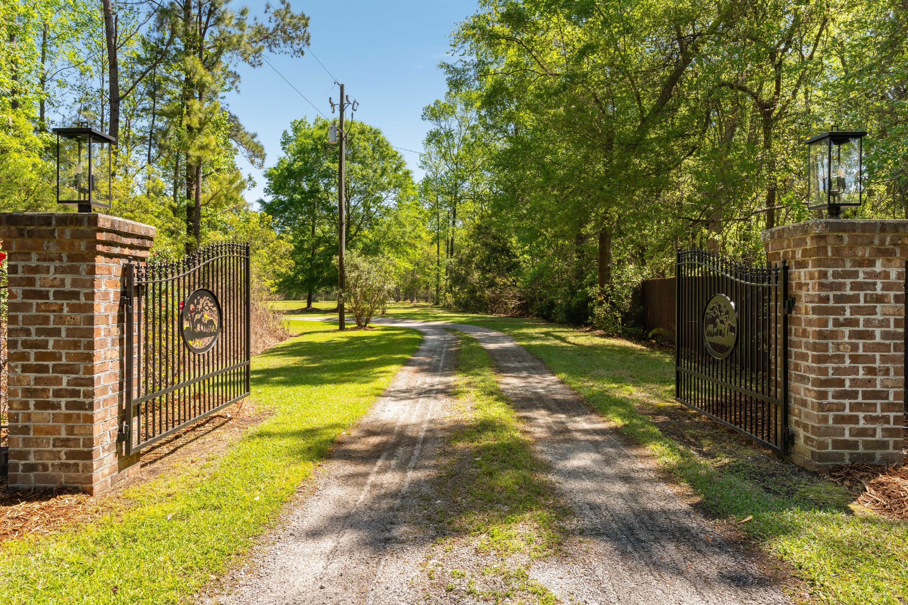 5680 Dixie Plantation Road Hollywood, SC 29449 - Photo 3 of 72 Gated entrance