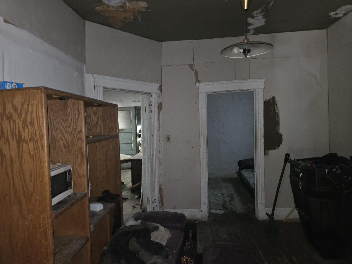 6619 South Aberdeen Street Chicago, IL 60621 - Photo 7 of 17 a bathroom with a sink and a mirror