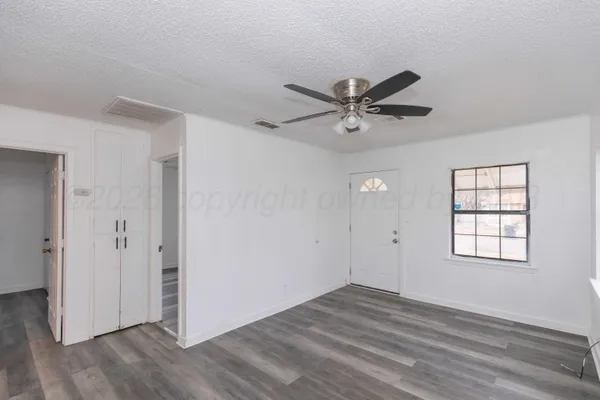 a kitchen that has a sink and a stove