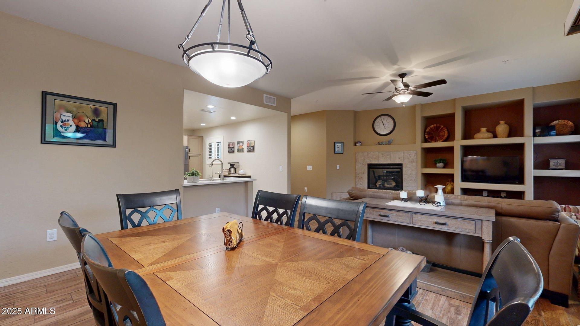 20121 North 76th Street, Unit 1047 Scottsdale, AZ 85255 - Photo 7 of 22 a view of a dining room with furniture