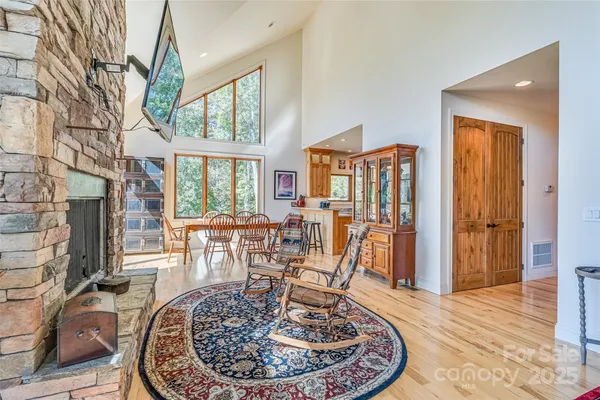 a view of a livingroom with furniture window and wooden floor