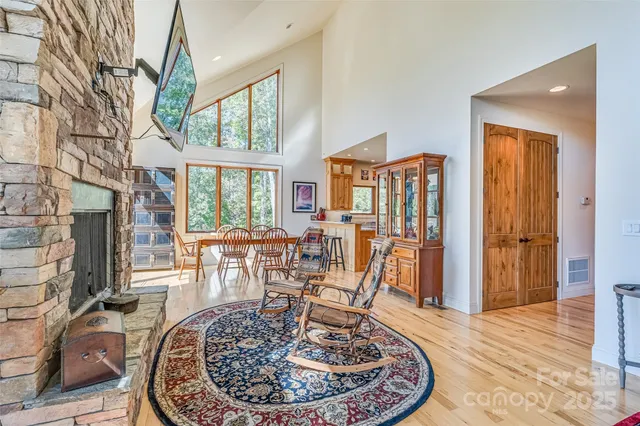 a view of a livingroom with furniture window and wooden floor