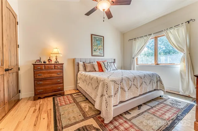 a bedroom with a bed and a walk in closet