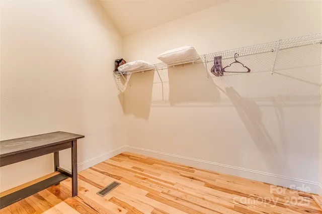 a view of a room with racks on the wall