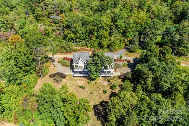 an aerial view of residential house with outdoor space