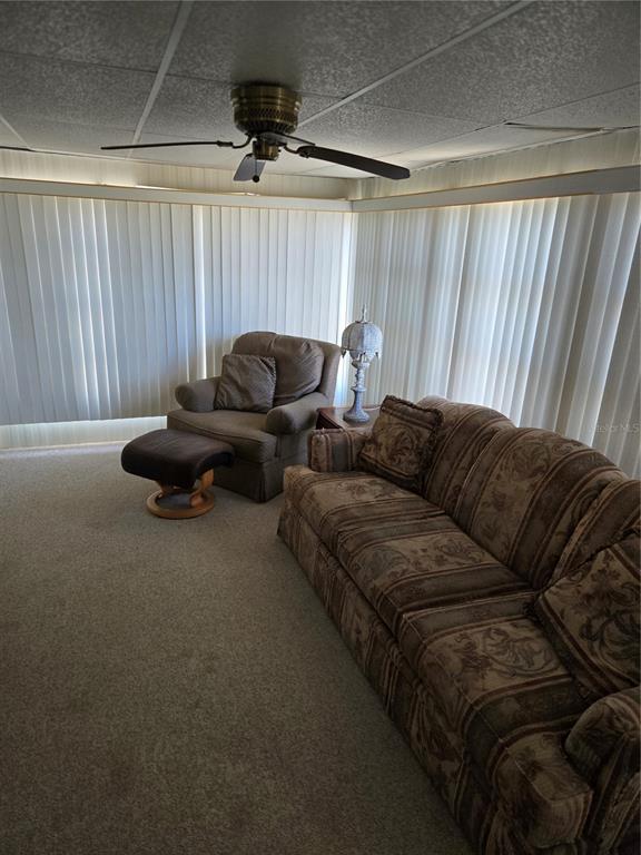 6162 Redwing Avenue Englewood, FL 34224 - Photo 21 of 23 a living room with furniture and a couch