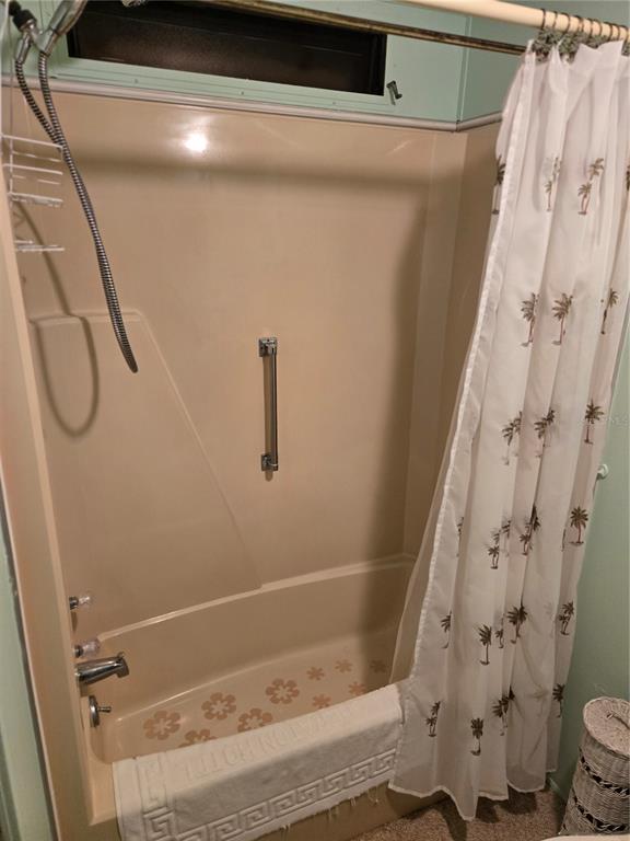 6162 Redwing Avenue Englewood, FL 34224 - Photo 10 of 23 a bathroom with a granite countertop sink and a mirror