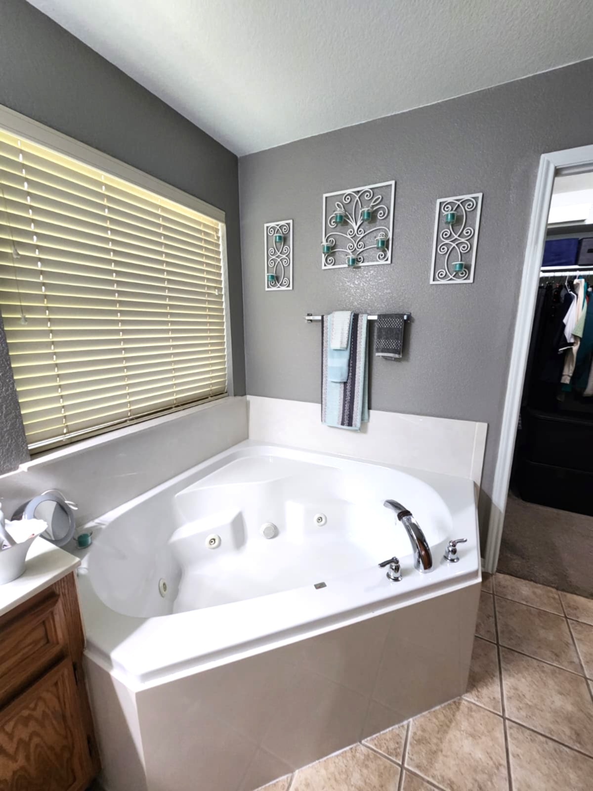 5603 Hunters Ridge Trail Killeen, TX 76542 - Photo 8 of 13 Indulge in relaxation within this primary bathroom featuring a corner soaking jet tub.