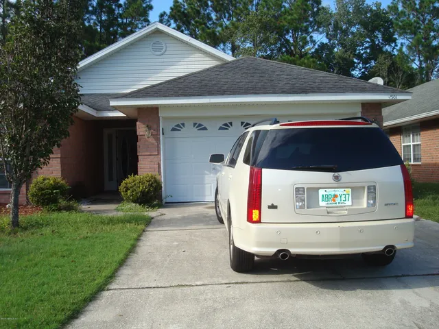 a car parked in front of house