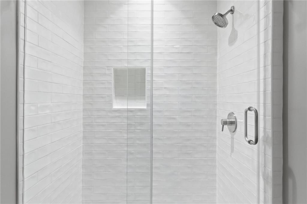 3875 Montvale Crossing Cumming, GA 30041 - Photo 27 of 53 a bathroom with a shower