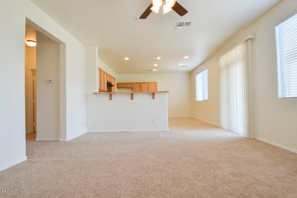 7332 West Maldonado Road Laveen, AZ 85339 - Photo 4 of 25 family room kitchen