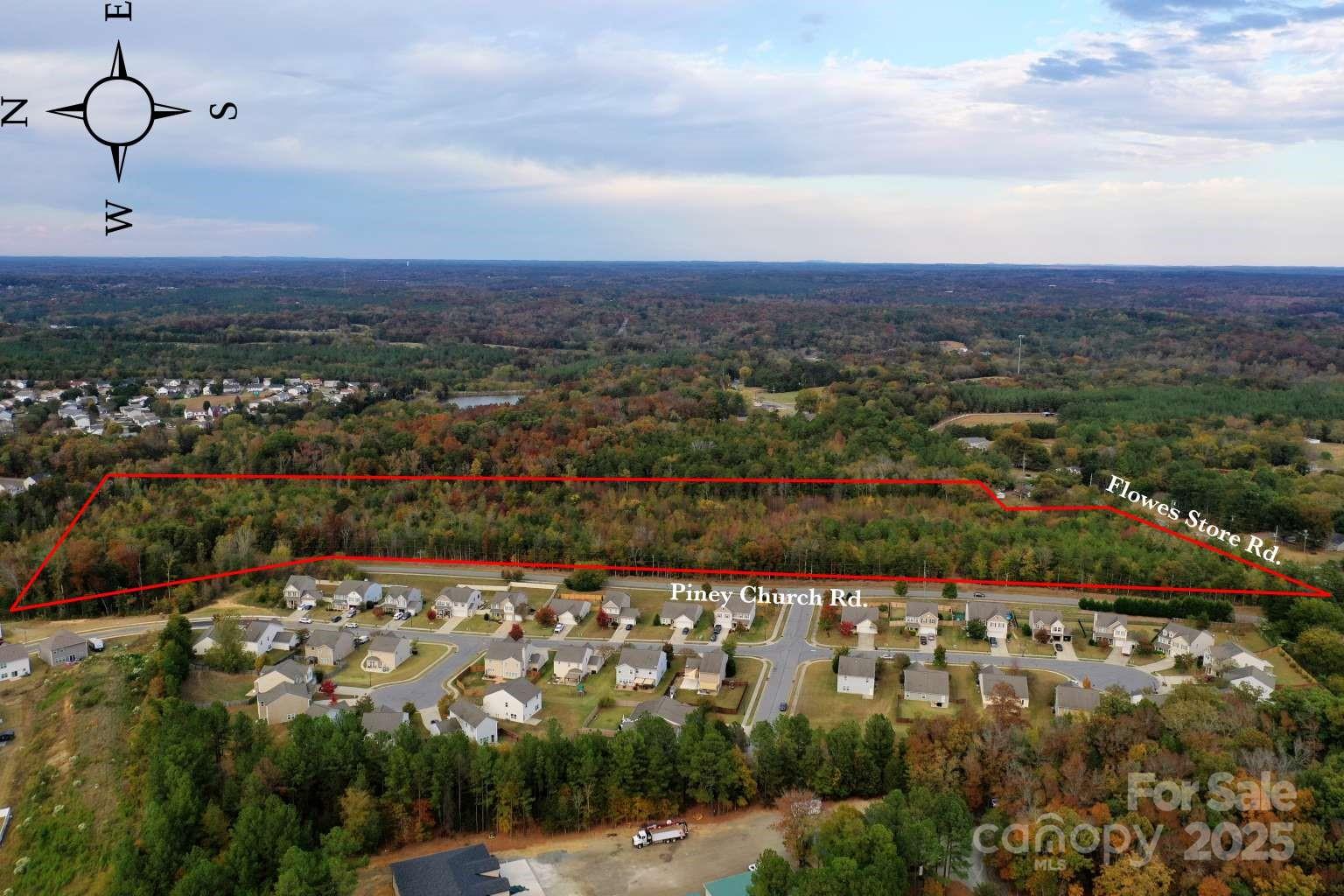 5582 Flowes Store Road Concord, NC 28025 - Photo 2 of 8 a view of a city