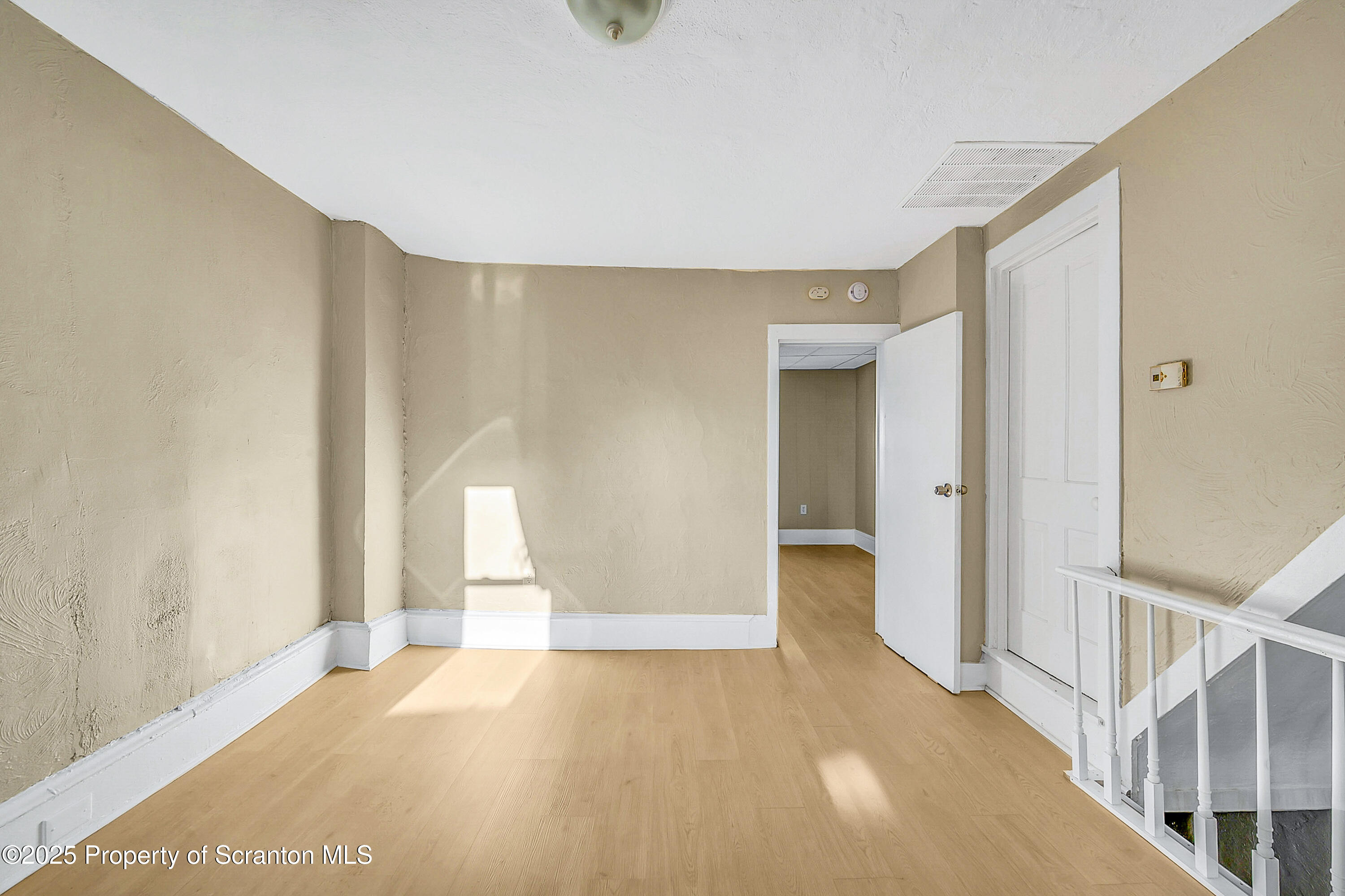 1007 Washburn Street, Unit 2 Scranton, PA 18504 - Photo 11 of 16 a view of an empty room and window