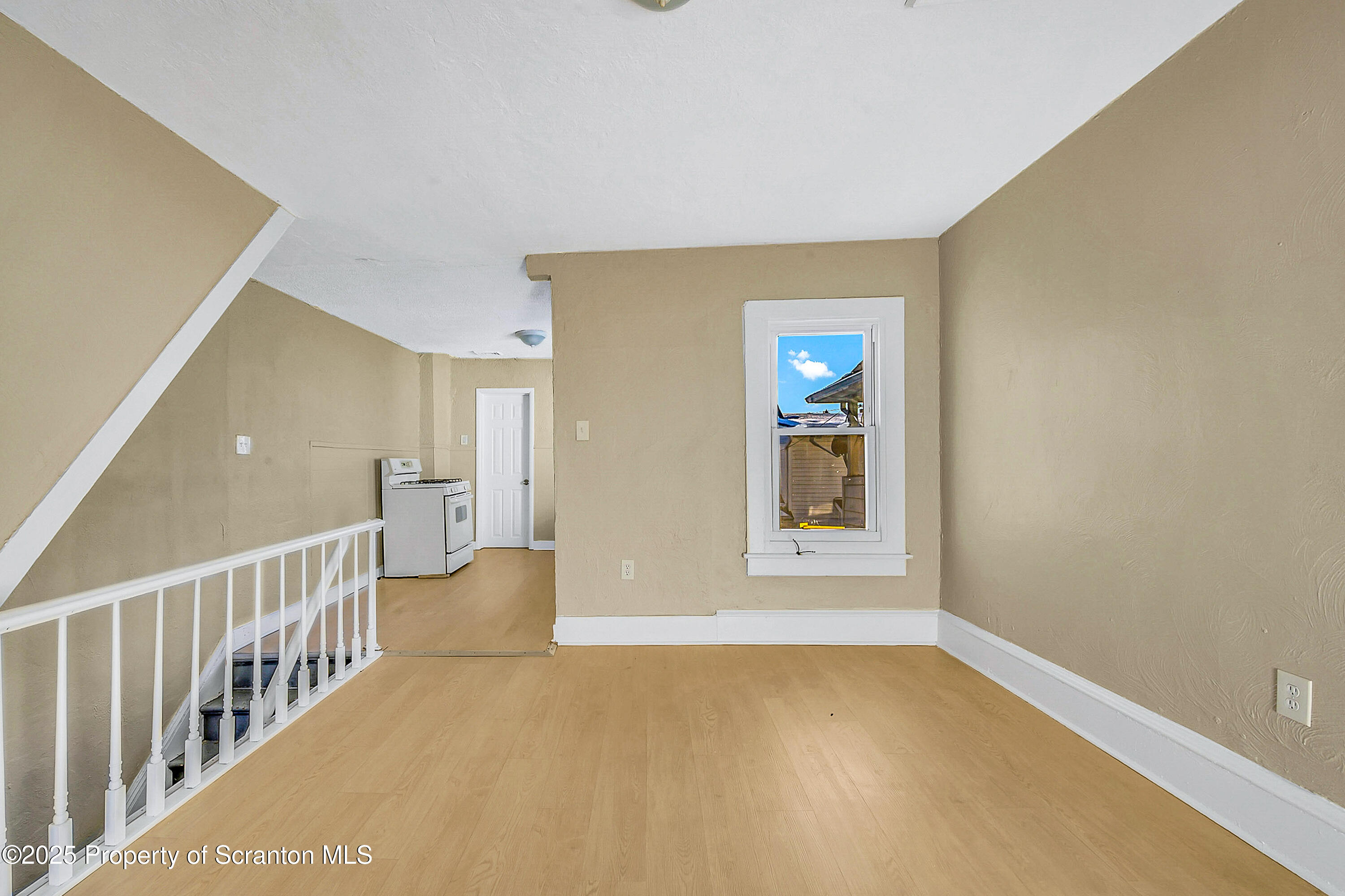 1007 Washburn Street, Unit 2 Scranton, PA 18504 - Photo 12 of 16 a view of an empty room with a window