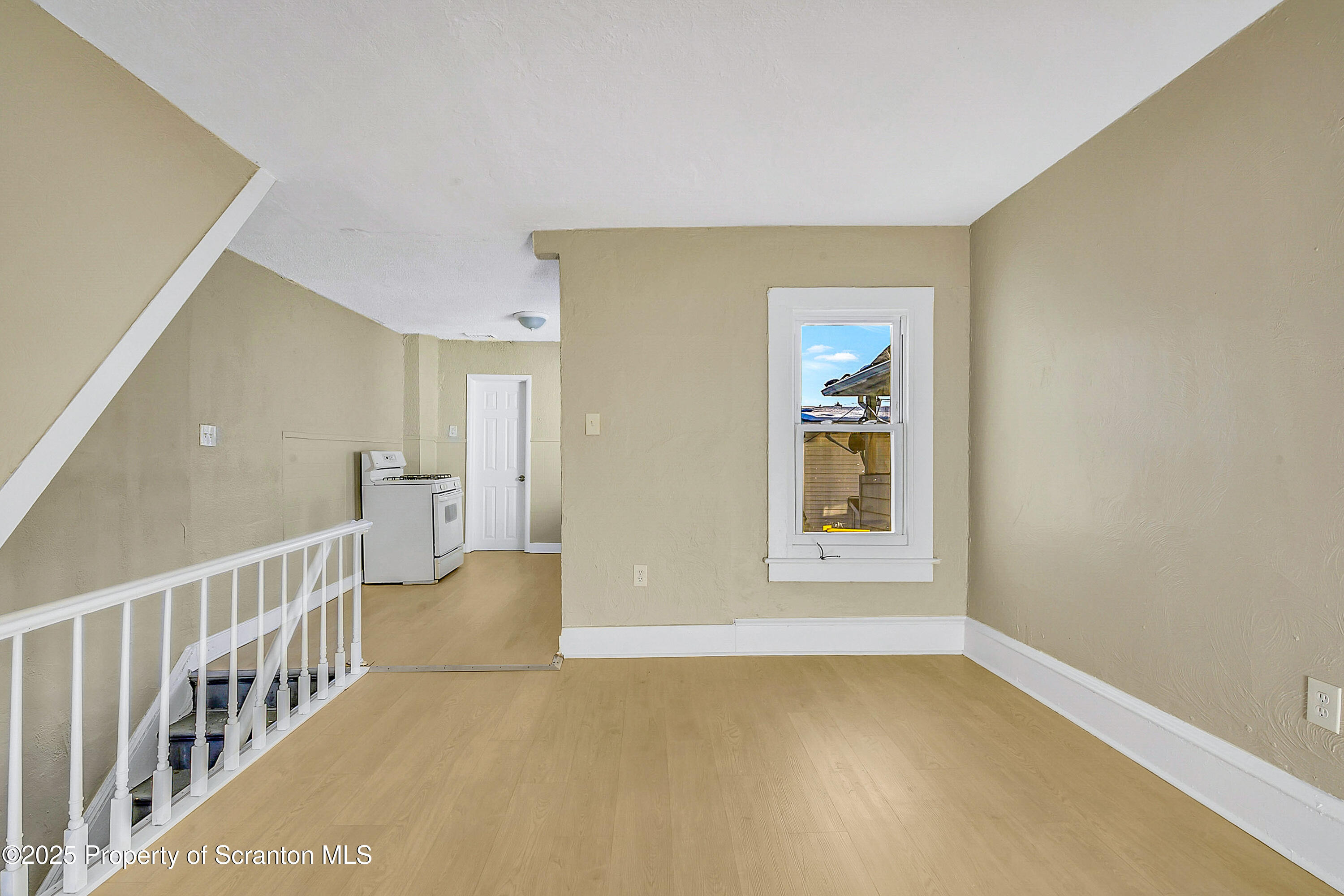 1007 Washburn Street, Unit 2 Scranton, PA 18504 - Photo 7 of 16 a view of an empty room with a window