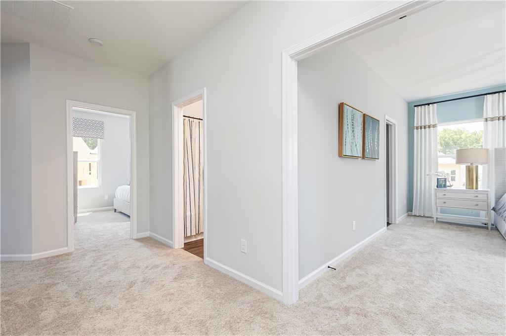 752 Coventry Cv Way Acworth, GA 30102 - Photo 24 of 34 a view of a livingroom with furniture and windows