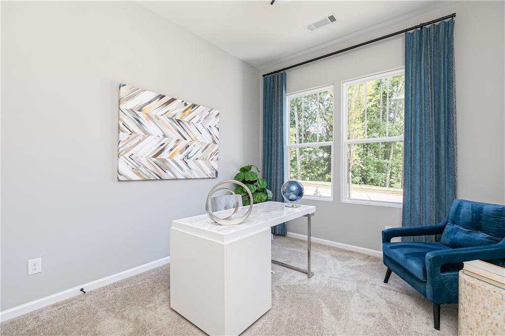 752 Coventry Cv Way Acworth, GA 30102 - Photo 5 of 34 a living room with furniture and a window