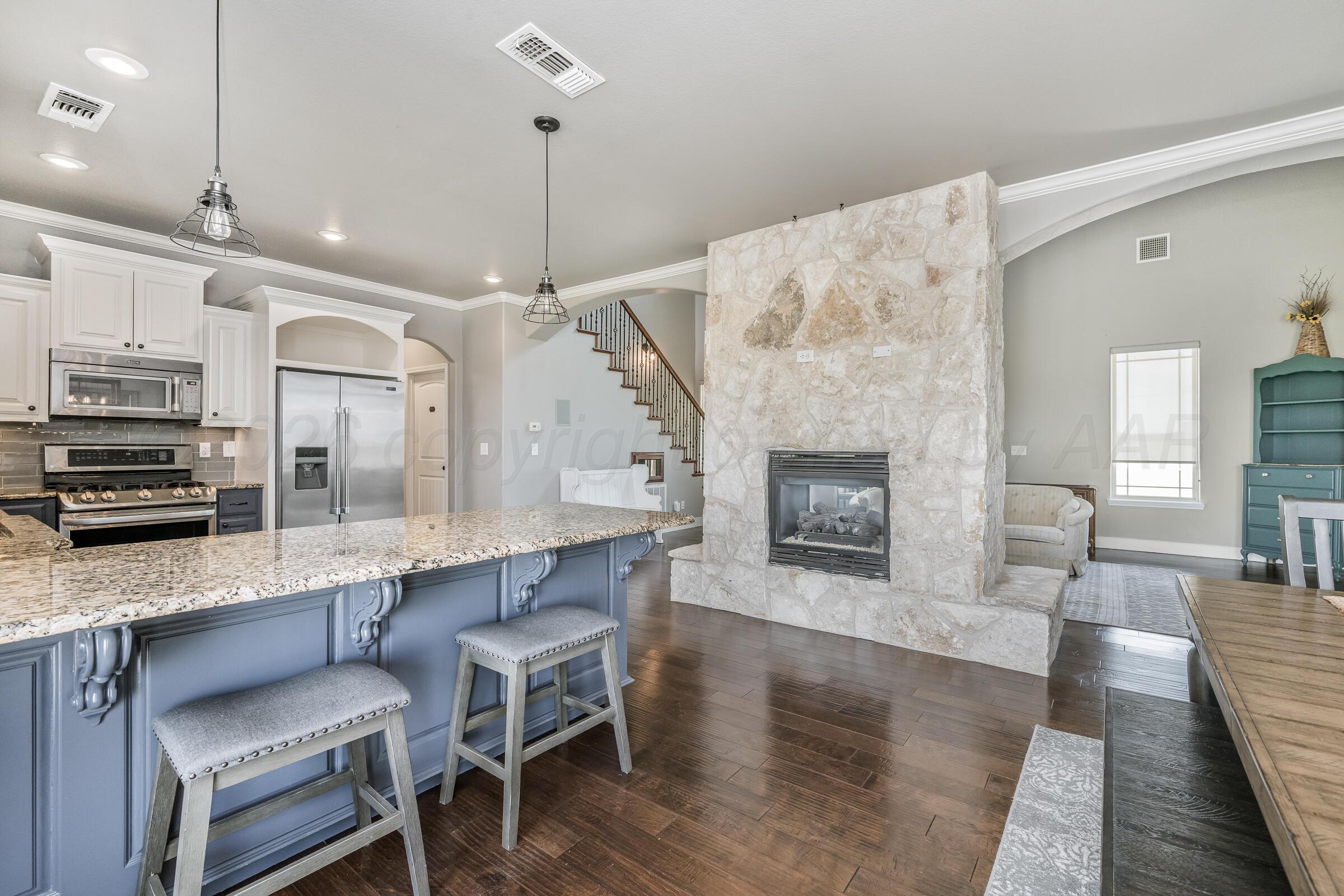 19600 Stoney Ridge Drive Amarillo, TX 79124 - Photo 11 of 41 Kitchen and Fire Place