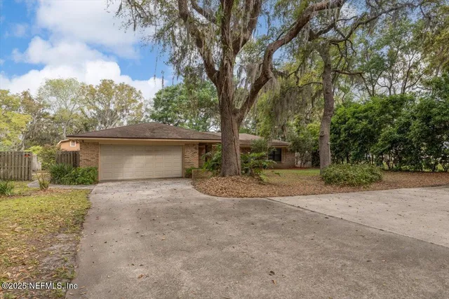 a view of a livingroom with wooden floor