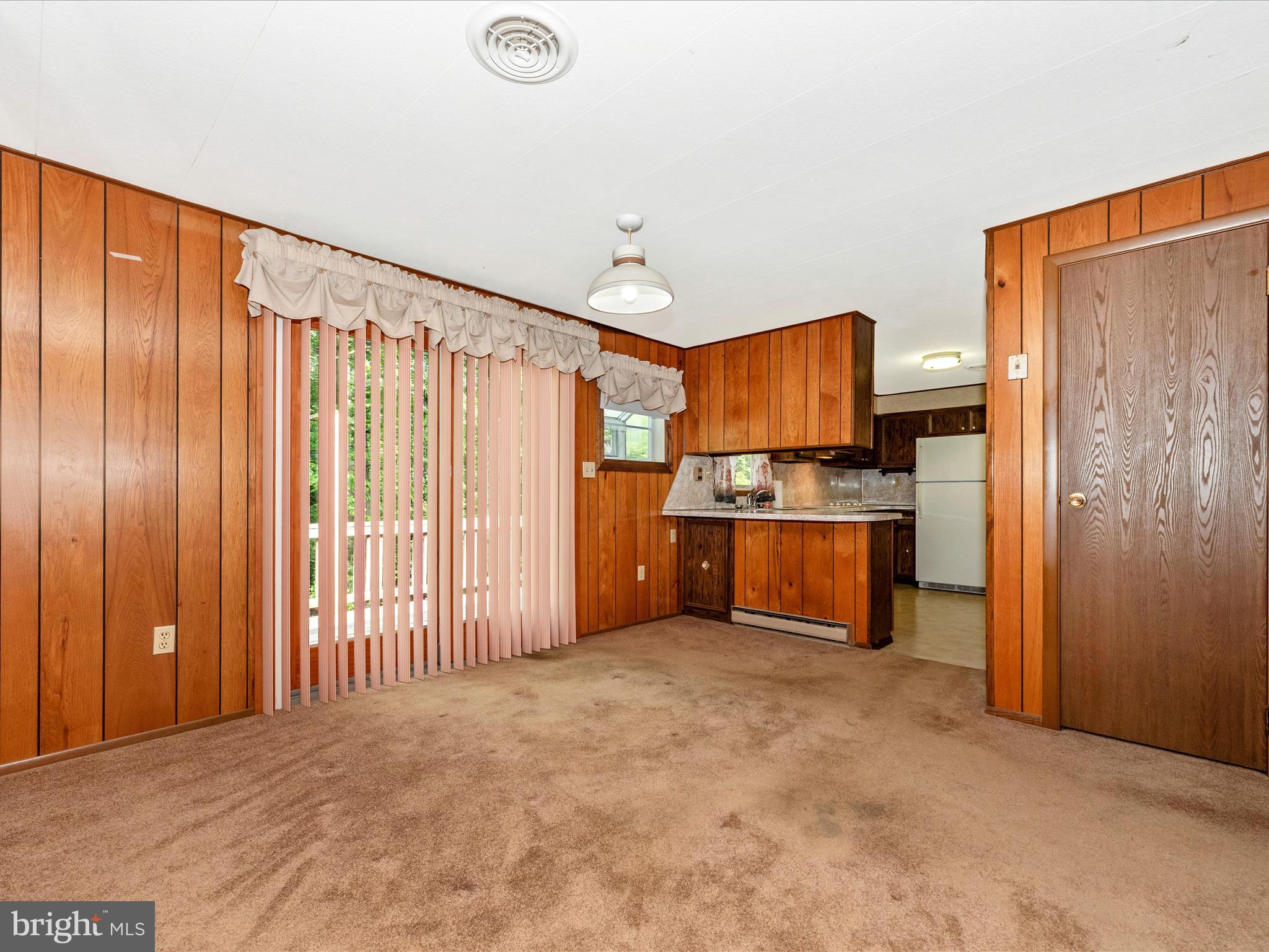 11732 Warner Road Keymar, MD 21757 - Photo 11 of 59 a view of kitchen with refrigerator and cabinets