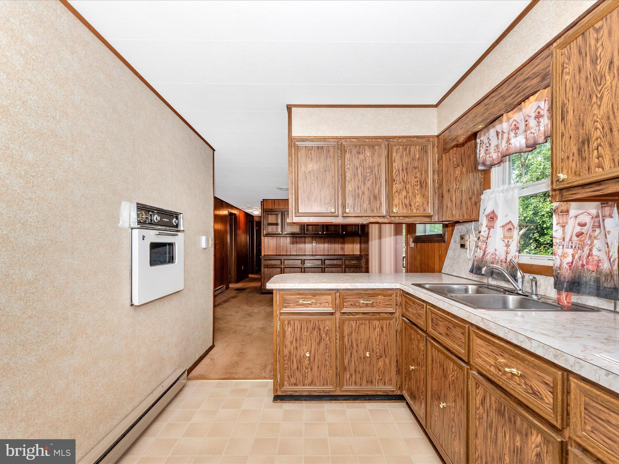 11732 Warner Road Keymar, MD 21757 - Photo 15 of 59 a kitchen with stainless steel appliances granite countertop a sink stove and refrigerator