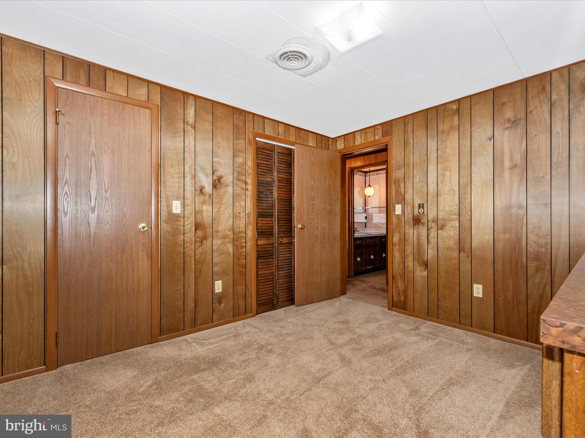 11732 Warner Road Keymar, MD 21757 - Photo 27 of 59 a view of a bathroom with closet and mirror