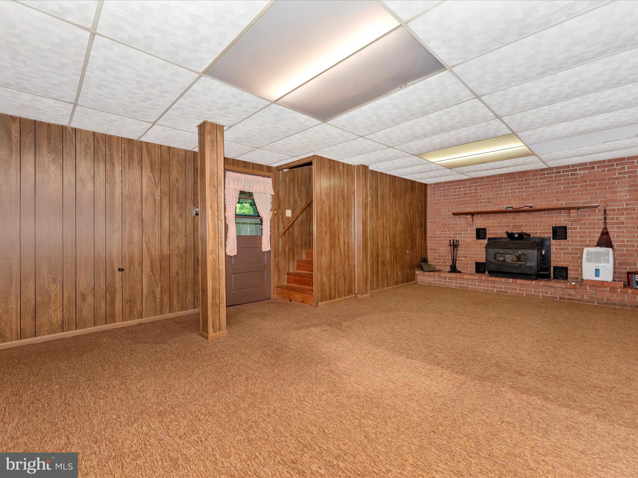 11732 Warner Road Keymar, MD 21757 - Photo 32 of 59 a view of empty room with a fireplace