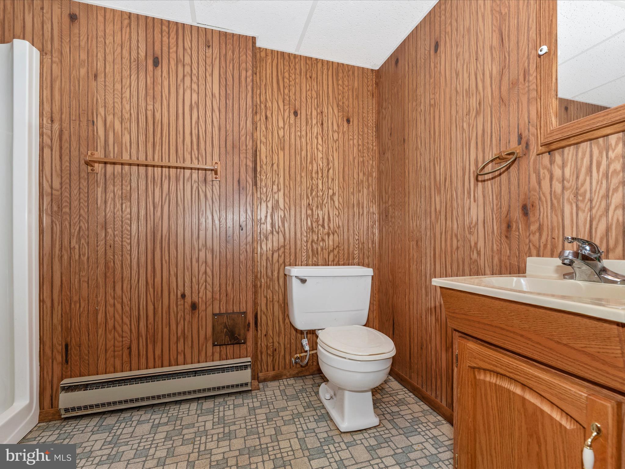 11732 Warner Road Keymar, MD 21757 - Photo 35 of 59 a bathroom with a toilet a sink and shower