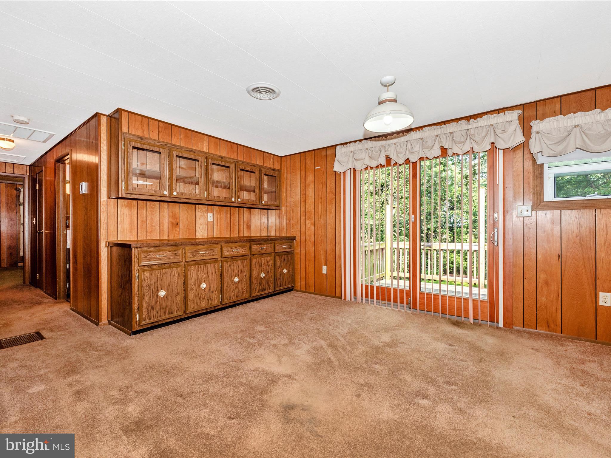 11732 Warner Road Keymar, MD 21757 - Photo 9 of 59 a view of a big room with windows and cabinet